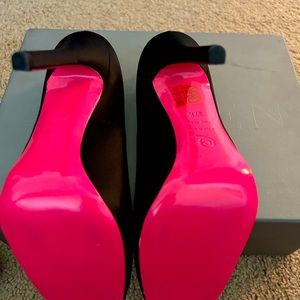 Alexander McQueen Block toe black satin heals pump.